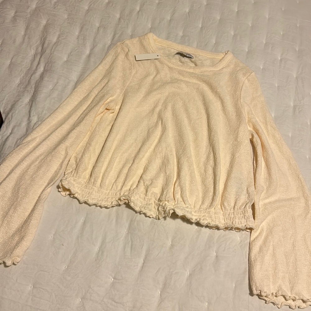 Cream bell sleeve top